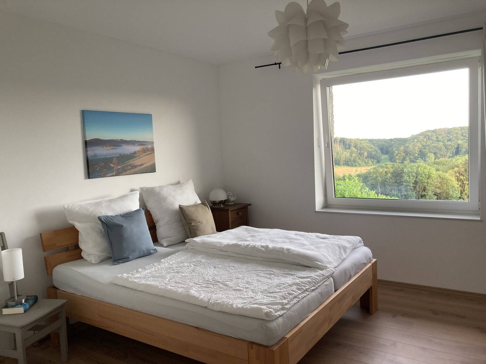 Schlafzimmer mit Waldblick